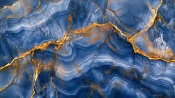 Striking blue and gold abstract pattern reminiscent of swirling waves and geological formations, creating a visually captivating texture. photo