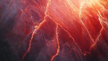 Abstract fiery texture with crackled lines, resembling heat or magma flow in a bold, vivid pattern with deep reds and glowing orange hues. photo