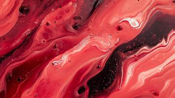 A captivating image showcasing the swirling, textured patterns of mixed red paints, creating an abstract and fluid visual experience. photo