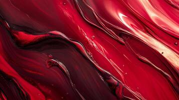 Abstract red paint waves and swirls create a dynamic and captivating pattern, showcasing the beauty of fluid motion and vibrant color. photo
