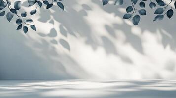 Minimalist scene of leaf shadows dancing across a bright wall, creating a calming atmosphere. Ideal for product presentation. photo