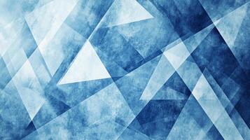 A textured, abstract background with geometric shapes and a blend of light and dark blues, creating depth and visual interest. photo