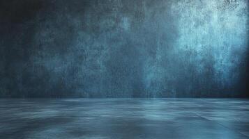 A textured blue wall and reflective floor create a dramatic, moody scene. Ideal for backgrounds and creative projects with a modern aesthetic. photo