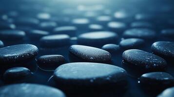 Zen garden stones in water create a calming and serene spa atmosphere. The tranquil scene promotes relaxation and peace. photo
