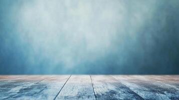 Blue-toned image featuring a weathered wooden surface in the foreground against a softly blurred, atmospheric background with a gradient effect. photo
