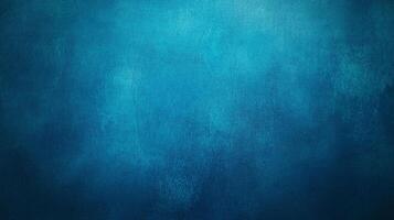 A textured blue background transitioning from light to dark tones, evoking a sense of depth, serenity, and calm with its abstract design. photo