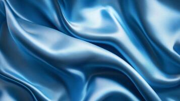 Elegant, smooth, and flowing, baby blue satin drapes beautifully with soft curves and graceful shadows, creating a sensual texture and luxury. photo