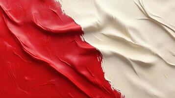 Textured abstract with red and cream color fields, showcasing dynamic brushstrokes, creating contrast between warm and cool tones photo