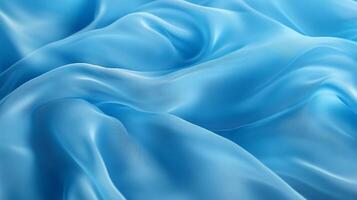 Abstract flowing fabric in soft blue hues, creating gentle waves and curves. The interplay of light and shadow adds depth and dimension. photo