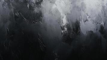 Abstract monochromatic artwork with textures. Shades of black and white blend in a dynamic, emotional composition evoking a sense of depth. photo