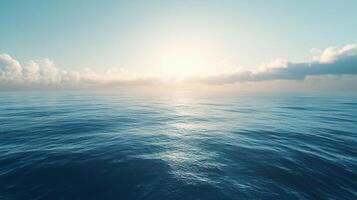 Serene blue sea stretches to the horizon, reflecting soft sunlight under a sky dotted with fluffy clouds, creating a peaceful seascape. photo