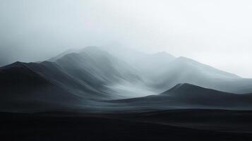 Ethereal mountainscape with gentle peaks emerging from a dense fog, evoking a sense of mystery and serenity in a monochrome palette. photo
