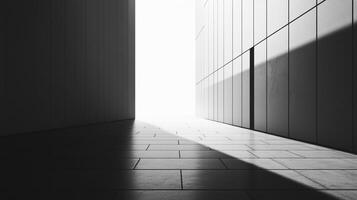 Geometric architecture showcasing a stark contrast between light and shadow, creating an abstract, modern aesthetic with minimalist elements. photo