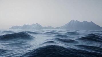 Serene ocean view with gentle waves, mountains shrouded in mist on the horizon, creating a peaceful seascape. Deep blue waters. photo
