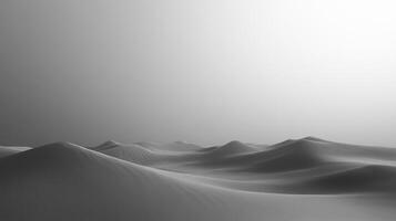 Monochromatic landscape of soft sand dunes under an overcast sky, creating a calming, serene and vast desert experience in black and white. photo