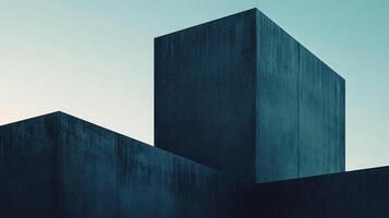 Abstract architectural composition of concrete structures against a pale sky, showcasing minimalist and brutalist design principles. photo