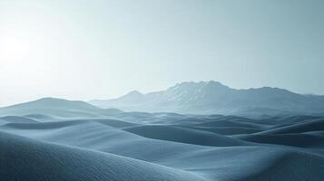 A serene landscape of sand dunes shrouded in a cool, ethereal blue mist, with distant mountains adding to the tranquil scene. photo