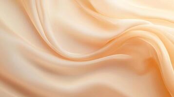 Elegant peach fabric gracefully flows with soft, gentle waves. Smooth and airy, creating a relaxing and inviting visual appeal. photo