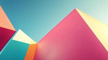 Abstract design featuring angular shapes and vibrant colors against a soft blue backdrop, creating a modern geometric composition. photo