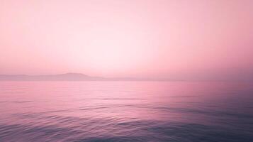 Serene seascape bathed in ethereal pink light, horizon meeting the tranquil waters under a soft sky, creating a peaceful ambiance. photo