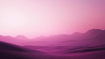Surreal landscape with rolling hills and mountains under a soft pink sky, creating a dreamlike and peaceful scenery. photo