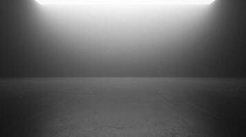 An atmospheric and minimalistic image featuring a smooth, dark floor leading to a bright, illuminated area at the back of the composition. photo