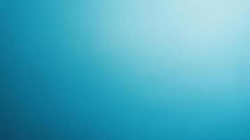 A gradient background that blends shades of blue and aqua, smoothly transitioning from darker tones to lighter, creating a serene and calming effect. photo
