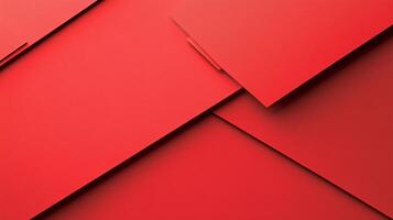 Overlapping planes of vibrant red create a dynamic and modern abstract composition, rich in shadows, texture and visual depth. photo