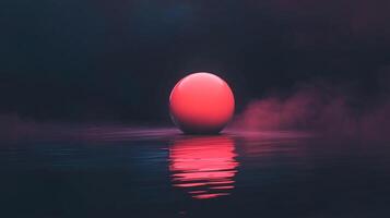 A luminous red sphere rests on a reflective surface, casting vibrant reflections in a dark, misty setting. Moody, modern and minimalist photo