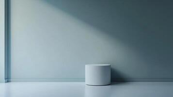 Minimalist studio with smooth cylindrical podium casting shadows against a pale blue backdrop, ideal for showcasing products or artwork. photo