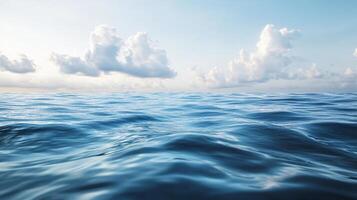 Vast ocean view with gentle waves under a bright sky. The horizon blends with the cloudscape in a serene and boundless seascape. photo
