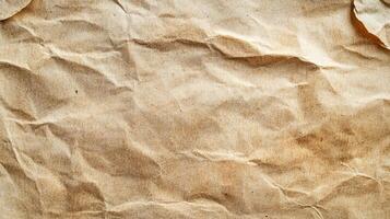 Textured paper with unique, crumpled surface. Brown tones create a vintage, aged effect. Adds character and visual interest to designs. photo