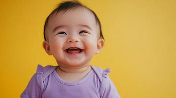 A joyful baby with a radiant smile, captured in a bright studio setting, their happiness illuminating the frame with warmth and cheer. photo