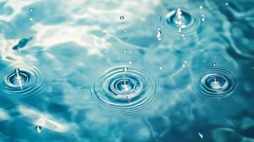 Water surface with falling droplets creating ripples, showcasing fluidity and serenity. Light reflects through clear liquid. photo