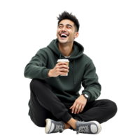 A man in a hoodie sitting on the floor holding a coffee png