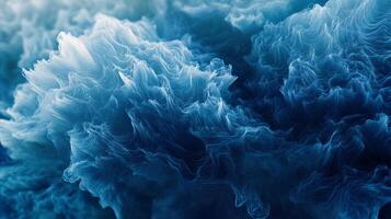 Abstract wave formation in deep blue shades, ethereal patterns create a captivating visual texture for a mesmerizing experience. photo