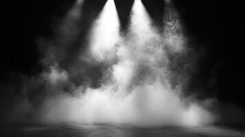 Dramatic stage lighting illuminates smoke and fog in a dark space, creating a sense of mystery and atmospheric depth with spotlights. photo