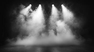 Dramatic stage with thick fog and bright spotlights shining down, creating a theatrical ambiance. Spotlight beams illuminate hazy atmosphere. photo