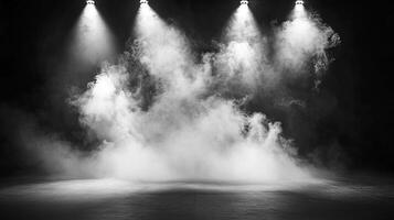 Ethereal stage lighting with smoke. Black and white photo of an empty stage. The bright lights pierce through thick smoke creating drama.