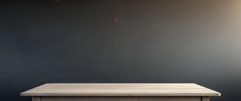 Empty wooden table on a dark background photo