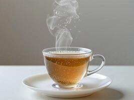 A cup of tea with steam coming out of it photo