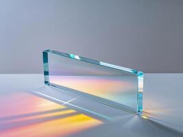 Clear Glass Rectangle with Colorful Reflections and Shadows photo