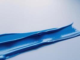 Blue brush stroke with a textured surface. photo