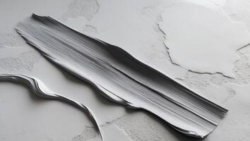 Gray brush stroke with a textured surface photo
