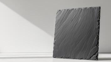 Black slate tile with a natural textured surface and rustic edges photo