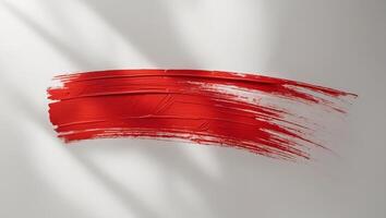 Red brushstroke creates a textured rectangular shape with visible brush marks adding a bold and energetic touch to any design. photo