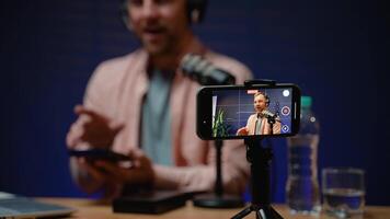 Tech Blogger Unpacking a Smartphone for Live Review video