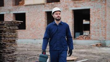 Construction worker walking at building site video