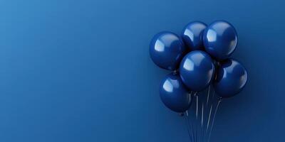 Blue balloons float together against a solid blue background in a simple and elegant display photo