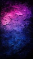 Colorful textured wall resembling abstract art with shades of purple and blue in a dark setting photo